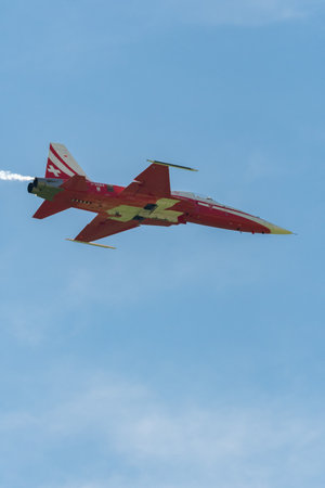 Mollis, Switzerland, August 18, 2023 Patrouille Suisse Northrop F-5E Tiger II military jet doing acrobatic flights during an air displayのeditorial素材