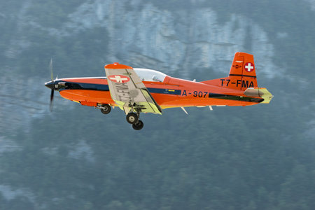 Mollis, Switzerland, August 18, 2023 Pilatus PC-7 aircraft is departing from runway 19のeditorial素材