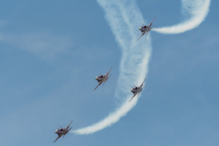 Mollis, Switzerland, August 18, 2023 Patrouille Suisse Northrop F-5E Tiger II military jet doing acrobatic flights during an air displayのeditorial素材