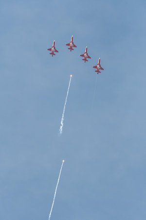 Mollis, Switzerland, August 18, 2023 Patrouille Suisse Northrop F-5E Tiger II military jet doing acrobatic flights during an air displayのeditorial素材