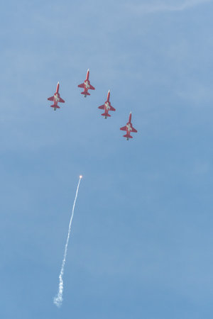 Mollis, Switzerland, August 18, 2023 Patrouille Suisse Northrop F-5E Tiger II military jet doing acrobatic flights during an air displayのeditorial素材