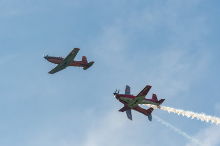 Mollis, Switzerland, August 18, 2023 Pilatur PC-7 Subito Team is performing during an air displayのeditorial素材