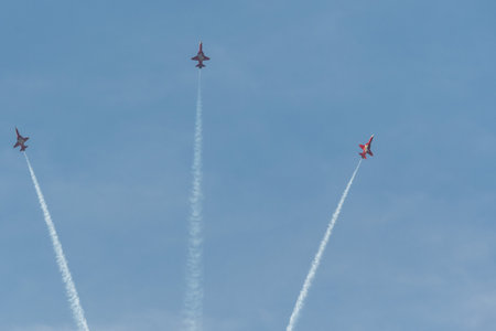 Mollis, Switzerland, August 18, 2023 Patrouille Suisse Northrop F-5E Tiger II military jet doing acrobatic flights during an air displayのeditorial素材