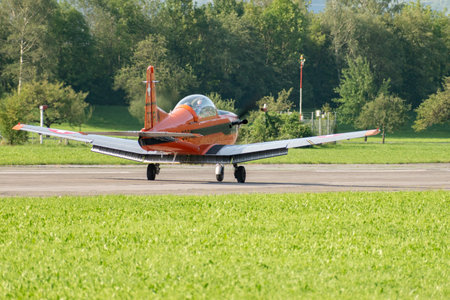Mollis, Switzerland, August 18, 2023 Pilatus PC-7 aircraft is taxiing along the runwayのeditorial素材