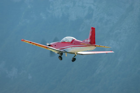 Mollis, Switzerland, August 18, 2023 Pilatus PC-7 aircraft is departing from runway 19のeditorial素材