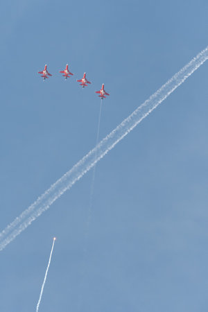 Mollis, Switzerland, August 18, 2023 Patrouille Suisse Northrop F-5E Tiger II military jet doing acrobatic flights during an air displayのeditorial素材