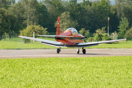 Mollis, Switzerland, August 18, 2023 Pilatus PC-7 aircraft is taxiing along the runwayのeditorial素材