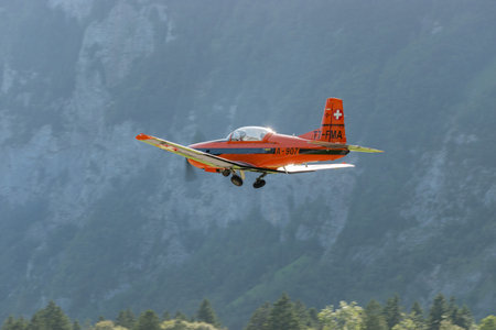 Mollis, Switzerland, August 18, 2023 Pilatus PC-7 aircraft is departing from runway 19のeditorial素材