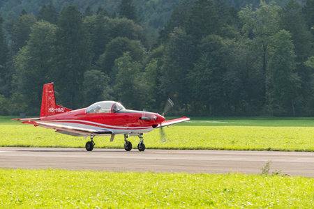 Mollis, Switzerland, August 18, 2023 Pilatus PC-7 aircraft is taxiing along the runwayのeditorial素材