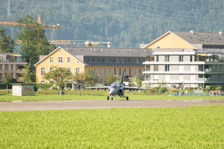Mollis, Switzerland, August 18, 2023 I-MJET SIAI 211 aircraft is taxiing on the runwayのeditorial素材