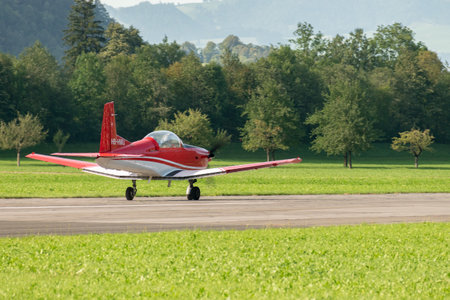 Mollis, Switzerland, August 18, 2023 Pilatus PC-7 aircraft is taxiing along the runwayのeditorial素材