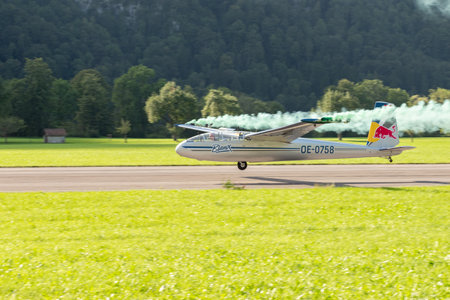 Mollis, Switzerland, August 18, 2023 LET Blanic L13 Glider acrobatic flight during an air displayのeditorial素材