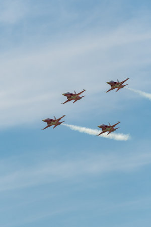 Mollis, Switzerland, August 18, 2023 Patrouille Suisse Northrop F-5E Tiger II military jet doing acrobatic flights during an air displayのeditorial素材