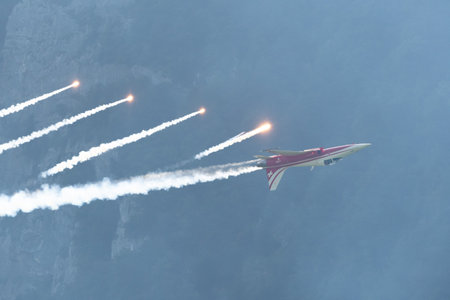 Mollis, Switzerland, August 18, 2023 Patrouille Suisse Northrop F-5E Tiger II military jet doing acrobatic flights during an air displayのeditorial素材