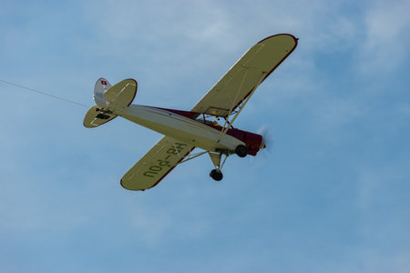 Mollis, Switzerland, August 18, 2023 HB-POU Piper PA-18 Super Cub aircraft is taking off from runway 01のeditorial素材