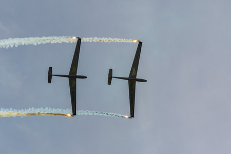 Mollis, Switzerland, August 18, 2023 LET Blanic L13 Glider acrobatic flight during an air displayのeditorial素材