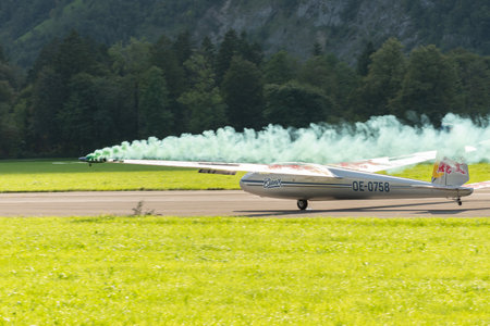 Mollis, Switzerland, August 18, 2023 LET Blanic L13 Glider acrobatic flight during an air displayのeditorial素材
