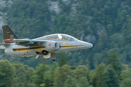 Mollis, Switzerland, August 18, 2023 I-MJET SIAI 211 aircraft is taking off from runway 01のeditorial素材
