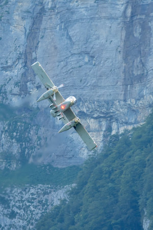Mollis, Switzerland, August 18, 2023 F-AZKM SIAI North american OV-10B Bronco is performing during an air displayのeditorial素材