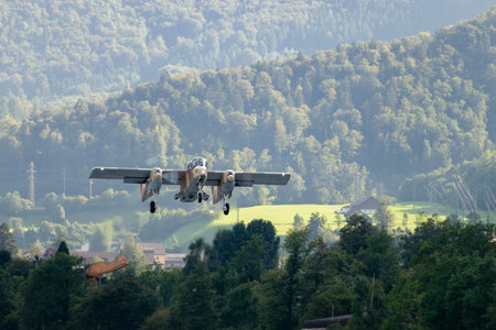 Mollis, Switzerland, August 18, 2023 F-AZKM North american OV-10B Bronco aircraft is taking off from...