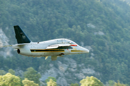 Mollis, Switzerland, August 18, 2023 I-MJET SIAI 211 aircraft is taking off from runway 01のeditorial素材