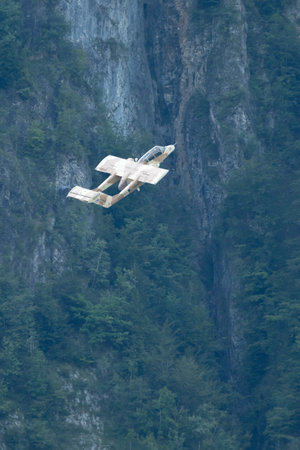 Mollis, Switzerland, August 18, 2023 F-AZKM SIAI North american OV-10B Bronco is performing during an air displayのeditorial素材