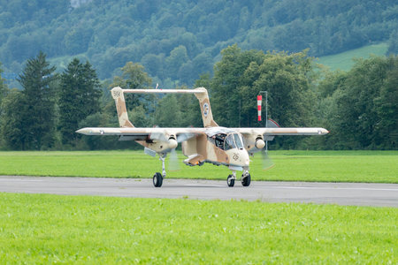 Mollis, Switzerland, August 18, 2023 F-AZKM North american OV-10B Bronco is landing on runway 01のeditorial素材