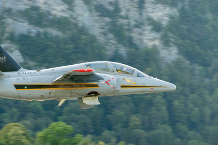Mollis, Switzerland, August 18, 2023 I-MJET SIAI 211 aircraft is taking off from runway 01のeditorial素材