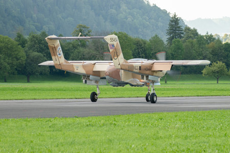 Mollis, Switzerland, August 18, 2023 F-AZKM North american OV-10B Bronco is landing on runway 01のeditorial素材