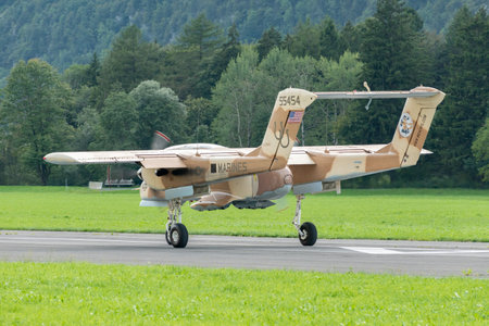 Mollis, Switzerland, August 18, 2023 F-AZKM North american OV-10B Bronco aircraft is taxiing on the runwayのeditorial素材