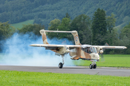 Mollis, Switzerland, August 18, 2023 F-AZKM North american OV-10B Bronco is landing on runway 01のeditorial素材