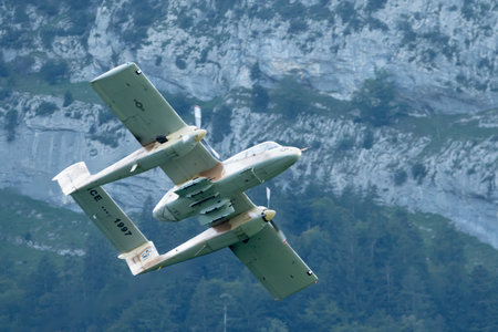Mollis, Switzerland, August 18, 2023 F-AZKM SIAI North american OV-10B Bronco is performing during an air displayのeditorial素材
