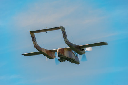 Mollis, Switzerland, August 18, 2023 F-AZKM North american OV-10B Bronco aircraft is taking off from runway 01のeditorial素材