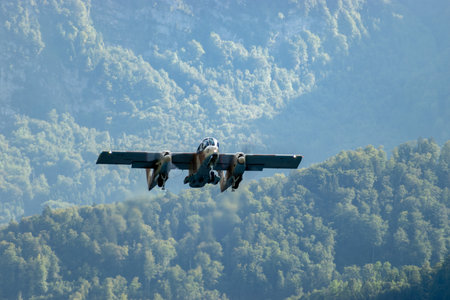 Mollis, Switzerland, August 18, 2023 F-AZKM North american OV-10B Bronco aircraft is taking off from runway 01のeditorial素材
