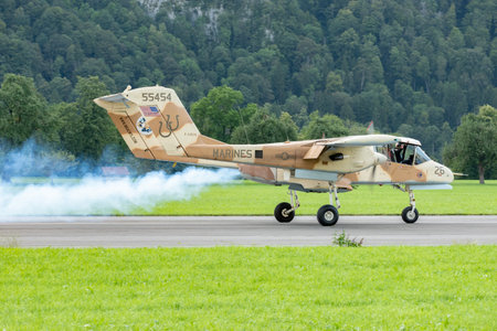 Mollis, Switzerland, August 18, 2023 F-AZKM North american OV-10B Bronco is landing on runway 01のeditorial素材
