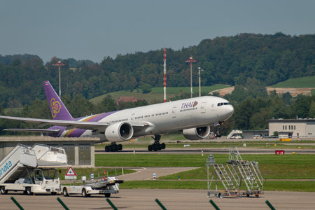 Zurich, Switzerland, September 6, 2023 HS-TKW Thai Airways Boeing 777-3D7ER aircraft is departing from runway 16のeditorial素材