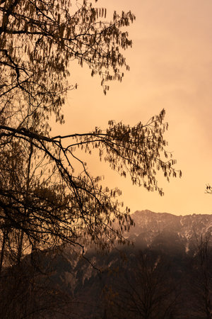 Schaan, Liechtenstein, January 17, 2023 Spooky atmospheric condition and a colorful sky in the eveningの写真素材