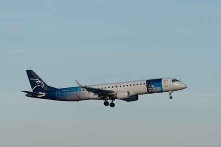 Zurich, Switzerland, January 14, 2024 E4-AOA Air Montenegro Embraer E195-LR aircraft is landing on...