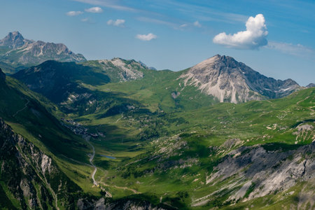 Zuers, Austria, July 30, 2024 View over the alpine Zuers area during a flight in a small propeller plane on a sunny dayの写真素材