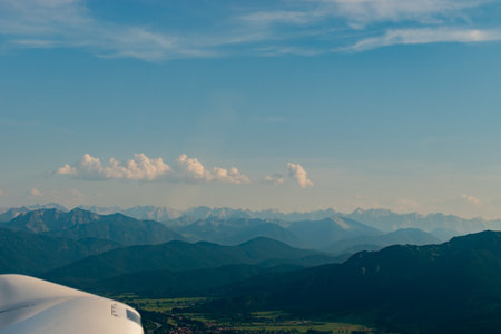 Bavaria, Germany, July 30, 2024 Alpine scenery during a flight in a small plane on a sunny dayの写真素材