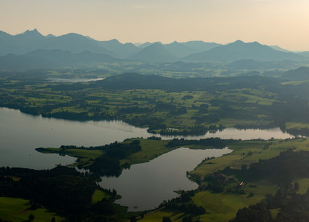Fuessen area, Germany, July 30, 2024 Lake Forggensee in Bavaria during a flight in a small planeの写真素材