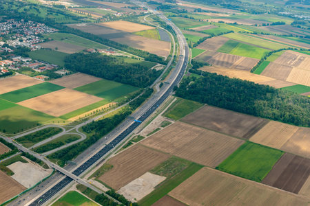 Bavaria, Germany, August 4, 2024 Highway east of Munich seen from above during a flight in a small...