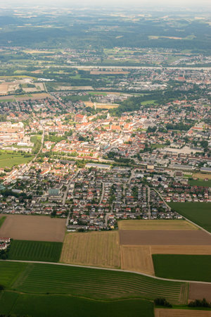 Altoetting, Germany, August 4, 2024 View over the city center during a flight in a small plane