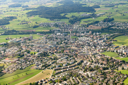 Baar, Switzerland, August 19, 2024 View over the city during a flight in a small plane