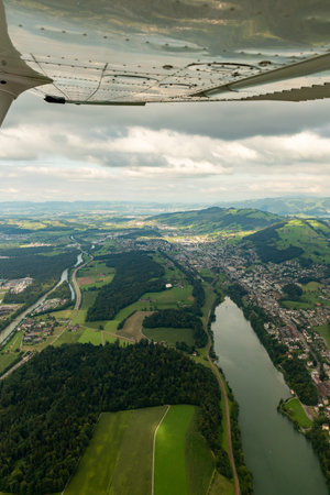 Luzern area, Switzerland, August 19, 2024 Countryside during a flight in a small planeの写真素材