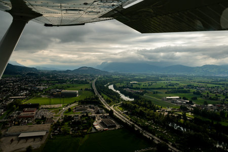 Hohenems, Austria, August 19, 2024 View over the rhine valley and the alps during a flight in a small planeの写真素材