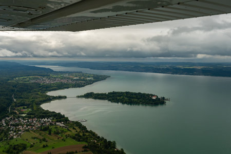 Mainau, Germany, August 19, 2024 View over the island and the lake of Constance during a flight in a small planeの写真素材