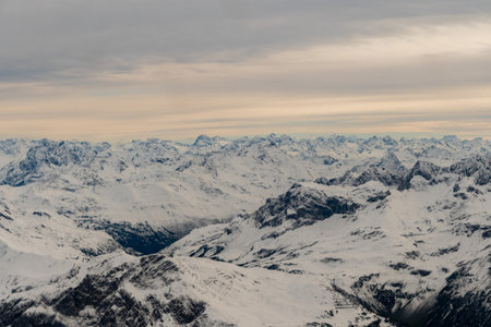 Vorarlberg area, Austria, September 29, 2024 Fantastic panorama scenery with white mountains in the austrian and german border region during a flight in a small planeの写真素材
