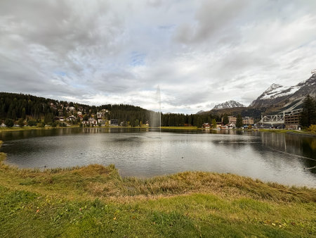 Arosa, Switzerland, October 12, 2024 Pretty lake with a water fountain in the city centerの写真素材