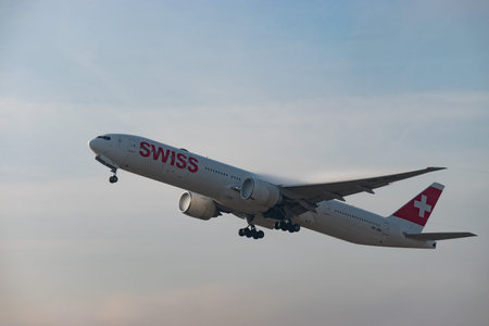 Zurich, Switzerland, January 21, 2026 HB-JNG Swiss Boeing 777-3DEER aircraft is taking off from...